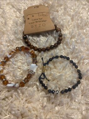 Brown Wood Bead Bracelet and two  brown sparkle bracelets